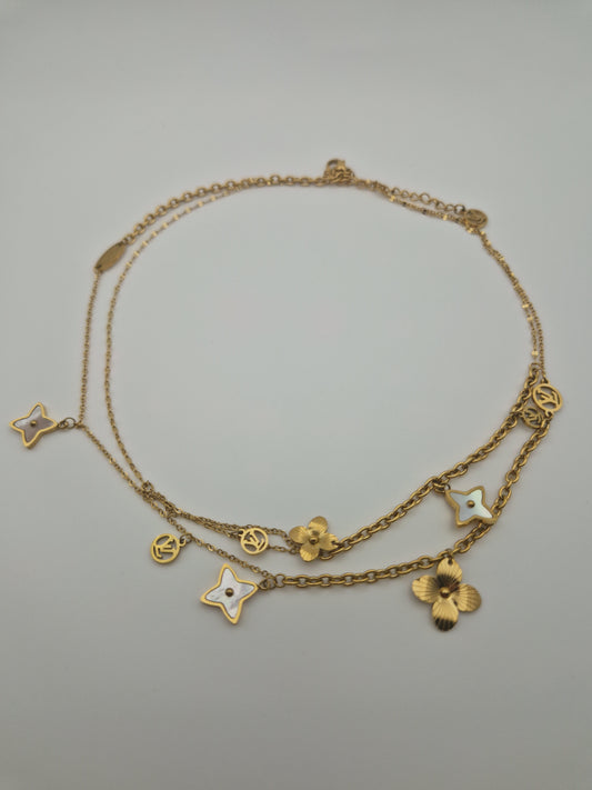 Collier "Éclat Floral Doré" – Multi-rangs à Charms Fleurs et Étoiles
